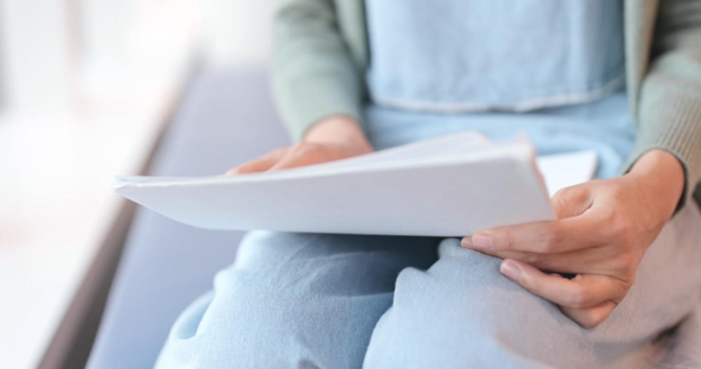 Software testing workspace with multiple devices and testing documentation